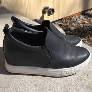 Black hidden wedge sneakers